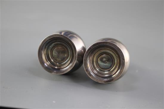 A pair of George V silver baluster pepperettes by S.W. Smith & Co, Birmingham, 1919, height 10.1cm, weight 3.5oz.